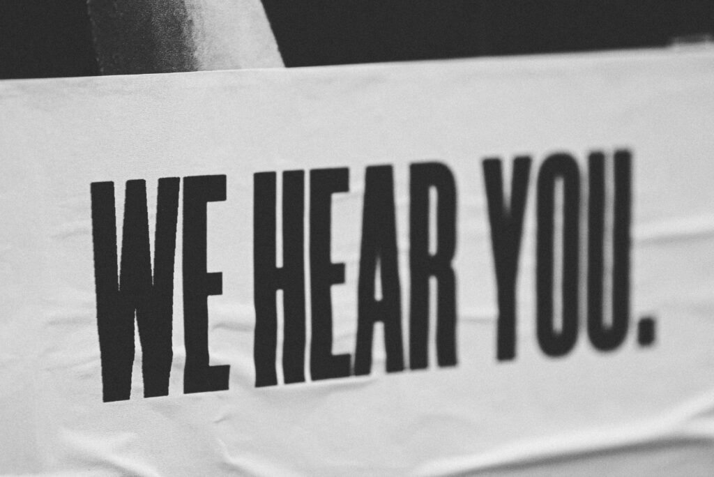 A banner with "we hear you." text