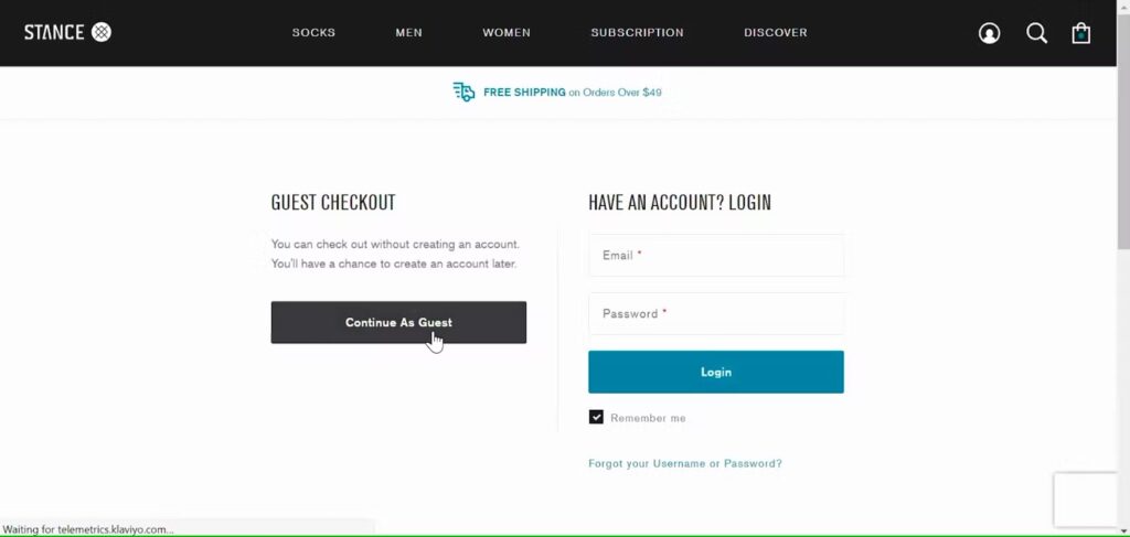 A website showing the option of guest checkout and account login
