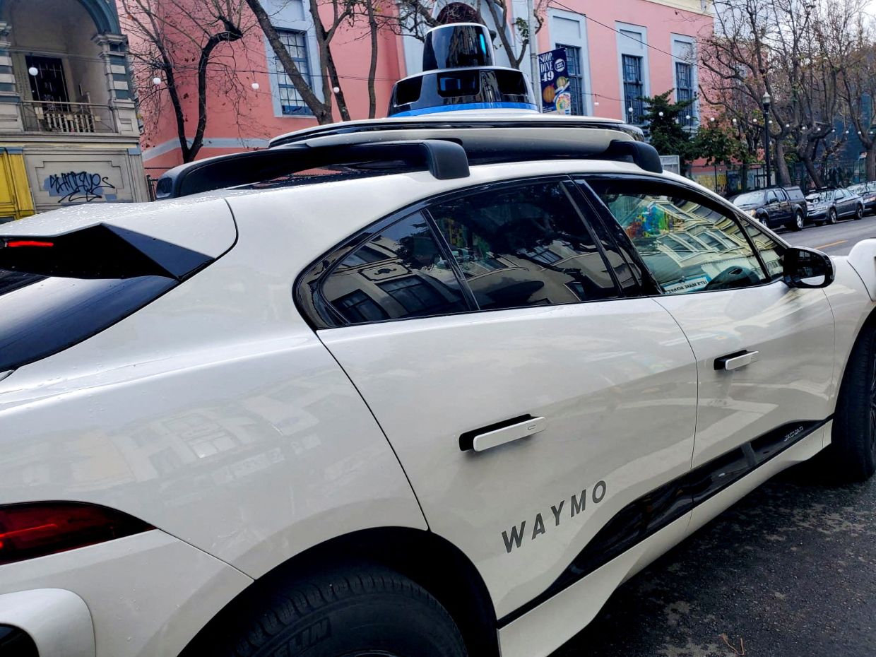 Men Stop Waymo Car in the Street to Catcall Female Passenger