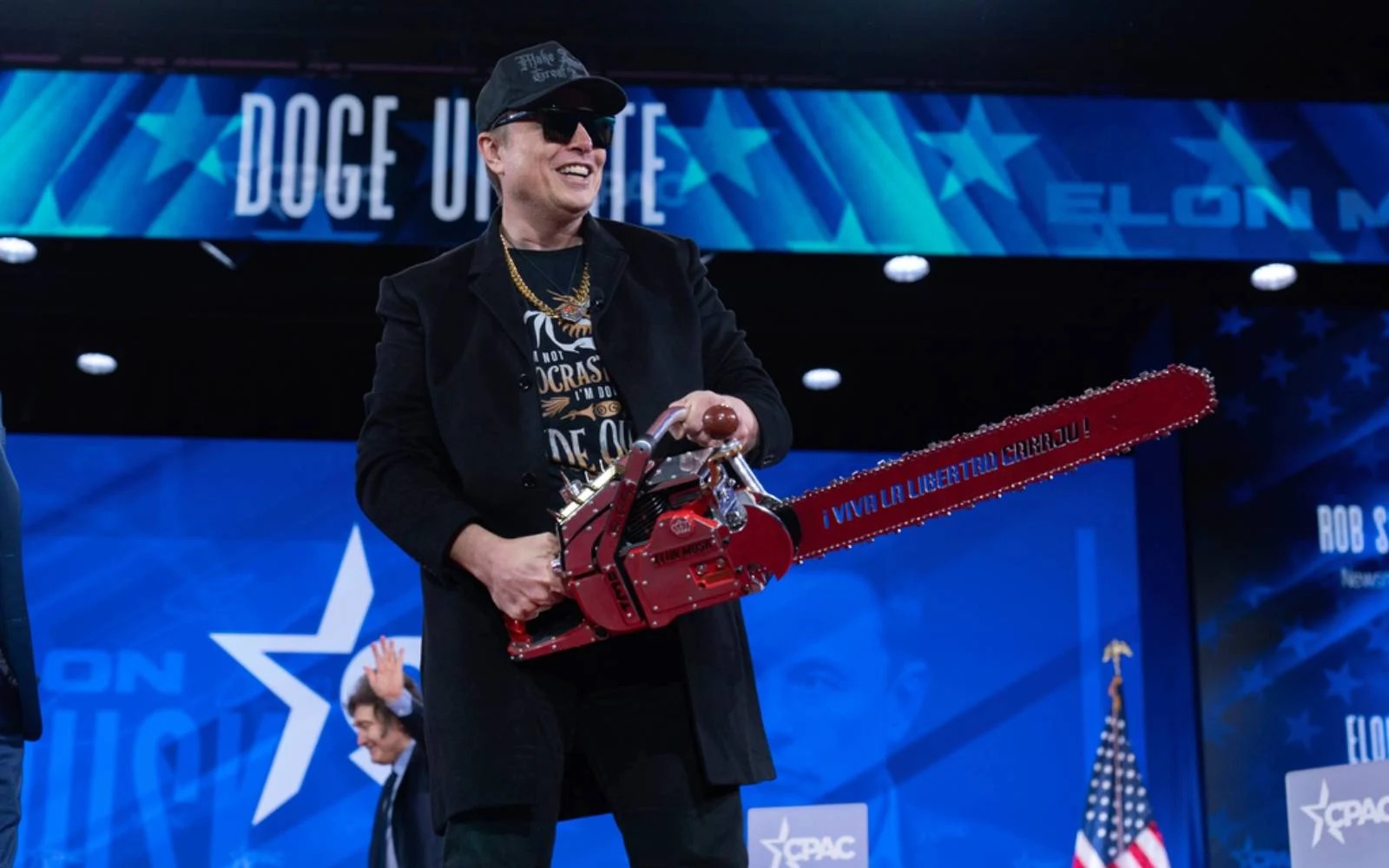 Musk Faces Backlash as He Wields His Doge Chainsaw